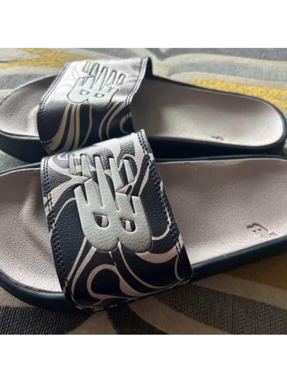 Ladies size 6 New Balance Black and White Slide Sandals